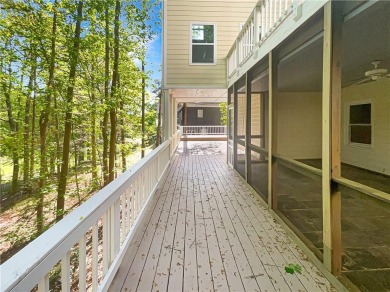 Welcome to this stunning 4-bedroom, 3.5-bath Woodstock home that on Canongate At Eagle Watch Golf Club in Georgia - for sale on GolfHomes.com, golf home, golf lot