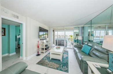 MILLION DOLLAR VIEW.. PRIVATE COMMUNITY BEACH.. FULLY UPDATED on Isla Del Sol Yacht and Country Club in Florida - for sale on GolfHomes.com, golf home, golf lot