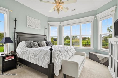 This stunning Creekside home offers front-row views of the on Crow Creek Golf Club in North Carolina - for sale on GolfHomes.com, golf home, golf lot