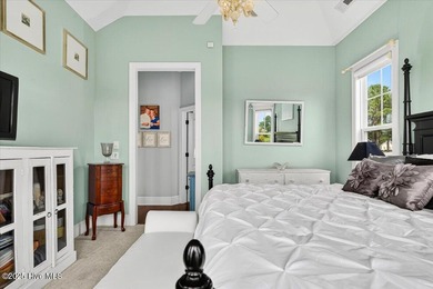 This stunning Creekside home offers front-row views of the on Crow Creek Golf Club in North Carolina - for sale on GolfHomes.com, golf home, golf lot