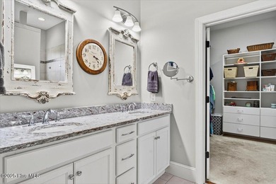 This stunning Creekside home offers front-row views of the on Crow Creek Golf Club in North Carolina - for sale on GolfHomes.com, golf home, golf lot