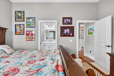 This stunning Creekside home offers front-row views of the on Crow Creek Golf Club in North Carolina - for sale on GolfHomes.com, golf home, golf lot