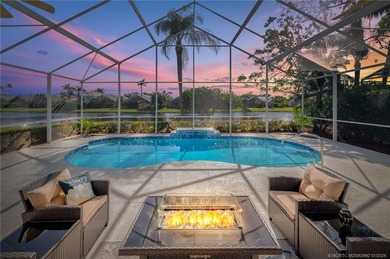 Ballantrae Pool Home with NEW ROOF, custom kitchen, new flooring on Santa Lucia River Club in Florida - for sale on GolfHomes.com, golf home, golf lot