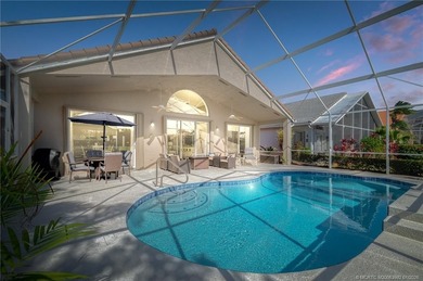 Ballantrae Pool Home with NEW ROOF, custom kitchen, new flooring on Santa Lucia River Club in Florida - for sale on GolfHomes.com, golf home, golf lot