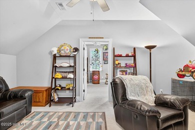 This stunning Creekside home offers front-row views of the on Crow Creek Golf Club in North Carolina - for sale on GolfHomes.com, golf home, golf lot