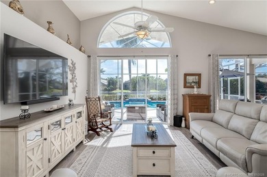 Ballantrae Pool Home with NEW ROOF, custom kitchen, new flooring on Santa Lucia River Club in Florida - for sale on GolfHomes.com, golf home, golf lot