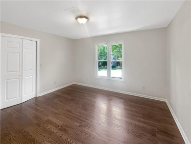 Welcome to this stunning 4-bedroom, 3.5-bath Woodstock home that on Canongate At Eagle Watch Golf Club in Georgia - for sale on GolfHomes.com, golf home, golf lot