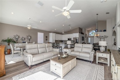 Ballantrae Pool Home with NEW ROOF, custom kitchen, new flooring on Santa Lucia River Club in Florida - for sale on GolfHomes.com, golf home, golf lot