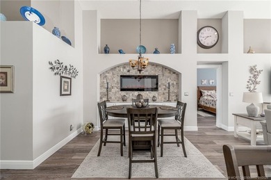 Ballantrae Pool Home with NEW ROOF, custom kitchen, new flooring on Santa Lucia River Club in Florida - for sale on GolfHomes.com, golf home, golf lot