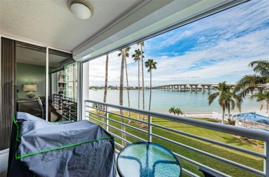 MILLION DOLLAR VIEW.. PRIVATE COMMUNITY BEACH.. FULLY UPDATED on Isla Del Sol Yacht and Country Club in Florida - for sale on GolfHomes.com, golf home, golf lot