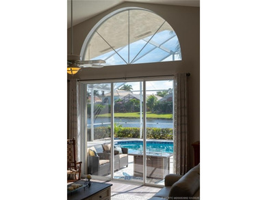 Ballantrae Pool Home with NEW ROOF, custom kitchen, new flooring on Santa Lucia River Club in Florida - for sale on GolfHomes.com, golf home, golf lot