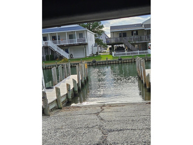 This cozy home is ready for you to preview and you won't be on Captains Cove Golf and Yacht Club in Virginia - for sale on GolfHomes.com, golf home, golf lot