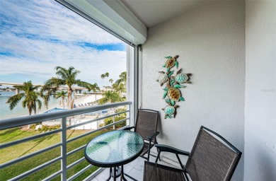 MILLION DOLLAR VIEW.. PRIVATE COMMUNITY BEACH.. FULLY UPDATED on Isla Del Sol Yacht and Country Club in Florida - for sale on GolfHomes.com, golf home, golf lot