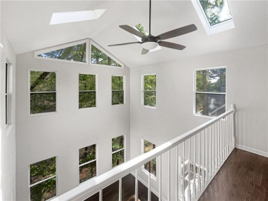 Welcome to this stunning 4-bedroom, 3.5-bath Woodstock home that on Canongate At Eagle Watch Golf Club in Georgia - for sale on GolfHomes.com, golf home, golf lot