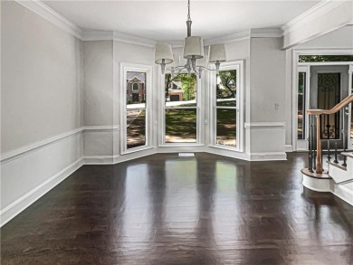 Welcome to this stunning 4-bedroom, 3.5-bath Woodstock home that on Canongate At Eagle Watch Golf Club in Georgia - for sale on GolfHomes.com, golf home, golf lot