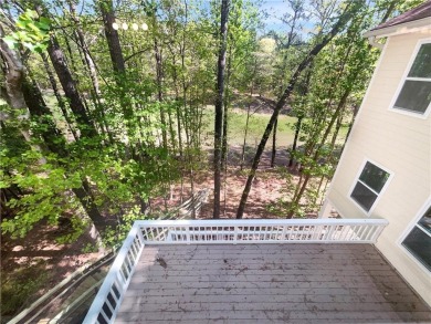 Welcome to this stunning 4-bedroom, 3.5-bath Woodstock home that on Canongate At Eagle Watch Golf Club in Georgia - for sale on GolfHomes.com, golf home, golf lot