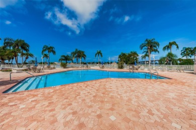 MILLION DOLLAR VIEW.. PRIVATE COMMUNITY BEACH.. FULLY UPDATED on Isla Del Sol Yacht and Country Club in Florida - for sale on GolfHomes.com, golf home, golf lot