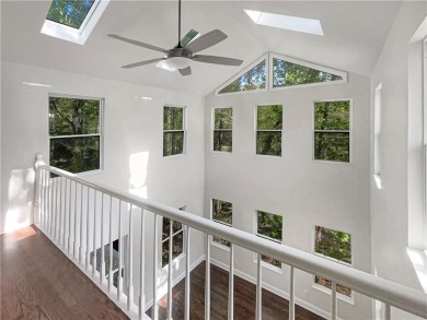 Welcome to this stunning 4-bedroom, 3.5-bath Woodstock home that on Canongate At Eagle Watch Golf Club in Georgia - for sale on GolfHomes.com, golf home, golf lot
