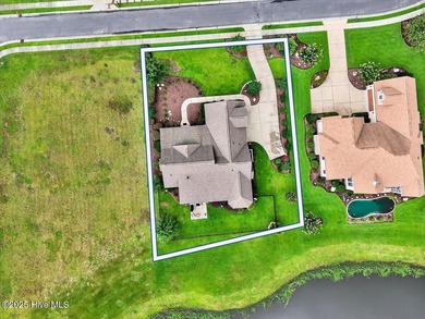 This stunning Creekside home offers front-row views of the on Crow Creek Golf Club in North Carolina - for sale on GolfHomes.com, golf home, golf lot