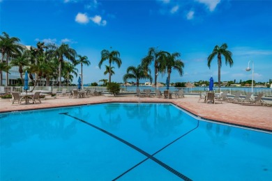 MILLION DOLLAR VIEW.. PRIVATE COMMUNITY BEACH.. FULLY UPDATED on Isla Del Sol Yacht and Country Club in Florida - for sale on GolfHomes.com, golf home, golf lot