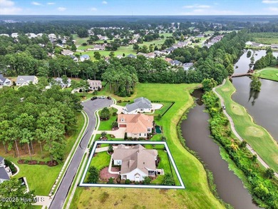 This stunning Creekside home offers front-row views of the on Crow Creek Golf Club in North Carolina - for sale on GolfHomes.com, golf home, golf lot