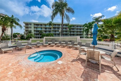 MILLION DOLLAR VIEW.. PRIVATE COMMUNITY BEACH.. FULLY UPDATED on Isla Del Sol Yacht and Country Club in Florida - for sale on GolfHomes.com, golf home, golf lot