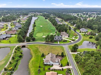 This stunning Creekside home offers front-row views of the on Crow Creek Golf Club in North Carolina - for sale on GolfHomes.com, golf home, golf lot