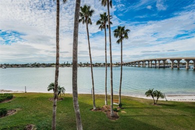 MILLION DOLLAR VIEW.. PRIVATE COMMUNITY BEACH.. FULLY UPDATED on Isla Del Sol Yacht and Country Club in Florida - for sale on GolfHomes.com, golf home, golf lot