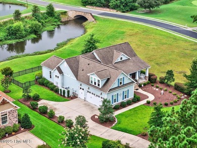 This stunning Creekside home offers front-row views of the on Crow Creek Golf Club in North Carolina - for sale on GolfHomes.com, golf home, golf lot