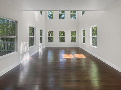 Welcome to this stunning 4-bedroom, 3.5-bath Woodstock home that on Canongate At Eagle Watch Golf Club in Georgia - for sale on GolfHomes.com, golf home, golf lot
