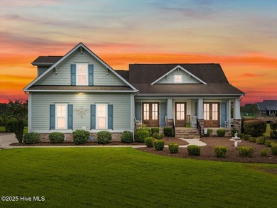 This stunning Creekside home offers front-row views of the on Crow Creek Golf Club in North Carolina - for sale on GolfHomes.com, golf home, golf lot