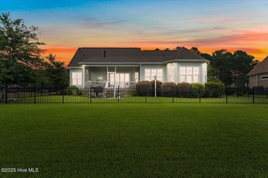 This stunning Creekside home offers front-row views of the on Crow Creek Golf Club in North Carolina - for sale on GolfHomes.com, golf home, golf lot