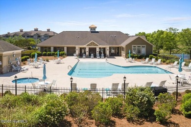 This stunning Creekside home offers front-row views of the on Crow Creek Golf Club in North Carolina - for sale on GolfHomes.com, golf home, golf lot