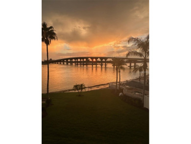 MILLION DOLLAR VIEW.. PRIVATE COMMUNITY BEACH.. FULLY UPDATED on Isla Del Sol Yacht and Country Club in Florida - for sale on GolfHomes.com, golf home, golf lot