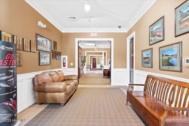 This stunning Creekside home offers front-row views of the on Crow Creek Golf Club in North Carolina - for sale on GolfHomes.com, golf home, golf lot