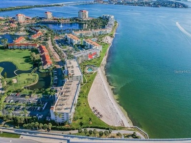 MILLION DOLLAR VIEW.. PRIVATE COMMUNITY BEACH.. FULLY UPDATED on Isla Del Sol Yacht and Country Club in Florida - for sale on GolfHomes.com, golf home, golf lot
