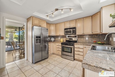 Framed by mountain VIEWS and set along a wide par 5 fairway on Cathedral Canyon Golf and Tennis Club in California - for sale on GolfHomes.com, golf home, golf lot