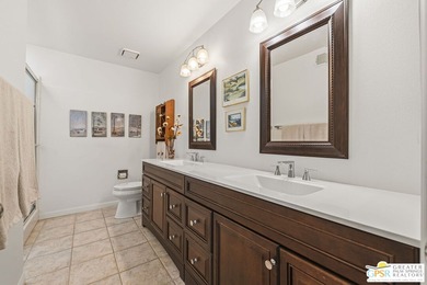 Wow! Framed by mountain views and set along a wide par 5 fairway on Cathedral Canyon Golf and Tennis Club in California - for sale on GolfHomes.com, golf home, golf lot