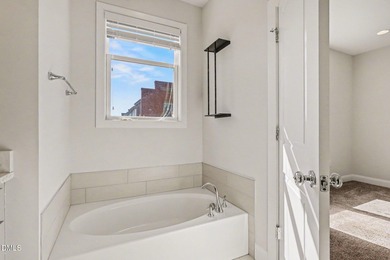 Rare opportunity to own this all-brick condo located directly on on Lonnie Poole Golf Course in North Carolina - for sale on GolfHomes.com, golf home, golf lot