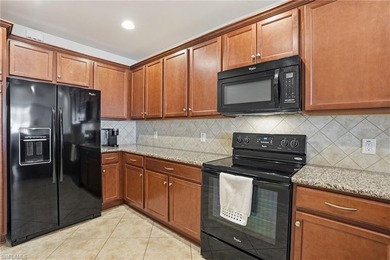 Original owner 2014-built, solid concrete-constructed townhome on Palmira Golf and Country Club in Florida - for sale on GolfHomes.com, golf home, golf lot