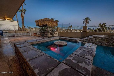 Welcome home to Castlewood, the iconic Havasu property in the on London Bridge Golf Course in Arizona - for sale on GolfHomes.com, golf home, golf lot