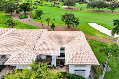 Exceptional golf course views wrap around this renovated on Quail Ridge Golf Course and Country Club in Florida - for sale on GolfHomes.com, golf home, golf lot