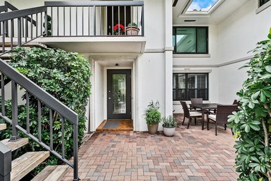 Exceptional golf course views wrap around this renovated on Quail Ridge Golf Course and Country Club in Florida - for sale on GolfHomes.com, golf home, golf lot