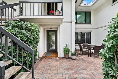 Exceptional golf course views wrap around this renovated on Quail Ridge Golf Course and Country Club in Florida - for sale on GolfHomes.com, golf home, golf lot