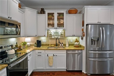 Located in a quiet community, and just as you arrive on St on Sea Island Golf Club in Georgia - for sale on GolfHomes.com, golf home, golf lot