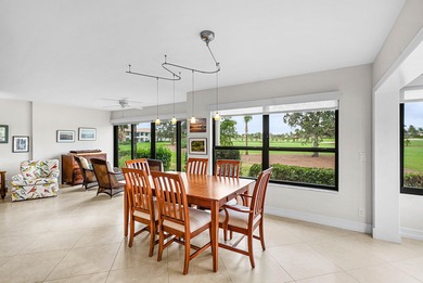 Exceptional golf course views wrap around this renovated on Quail Ridge Golf Course and Country Club in Florida - for sale on GolfHomes.com, golf home, golf lot