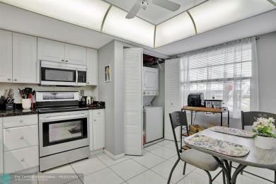 BEAUTIFUL VIEW BEAUTIFUL KITCHEN WASHER DRYER IN UNIT. STAINLESS on Oriole Golf and Tennis Club in Florida - for sale on GolfHomes.com, golf home, golf lot