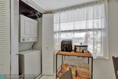 BEAUTIFUL VIEW BEAUTIFUL KITCHEN WASHER DRYER IN UNIT. STAINLESS on Oriole Golf and Tennis Club in Florida - for sale on GolfHomes.com, golf home, golf lot