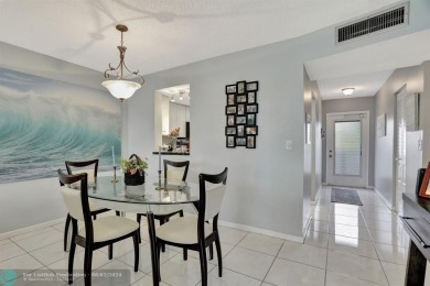 BEAUTIFUL VIEW BEAUTIFUL KITCHEN WASHER DRYER IN UNIT. STAINLESS on Oriole Golf and Tennis Club in Florida - for sale on GolfHomes.com, golf home, golf lot