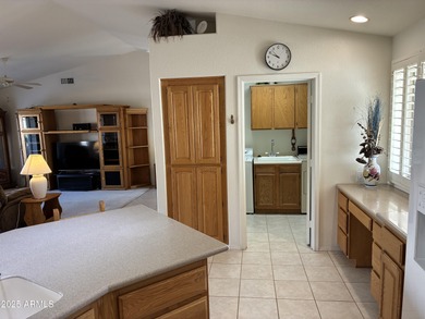 Beautiful kitchen designed for the wife, her desk, her laundry on Sunland Springs Golf Course  in Arizona - for sale on GolfHomes.com, golf home, golf lot